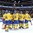 MALMO, SWEDEN - DECEMBER 28: Sweden players salute the crowd at Malmo Arena after a preliminary round win over Finland at the 2014 IIHF World Junior Championship. (Photo by Andre Ringuette/HHOF-IIHF Images)